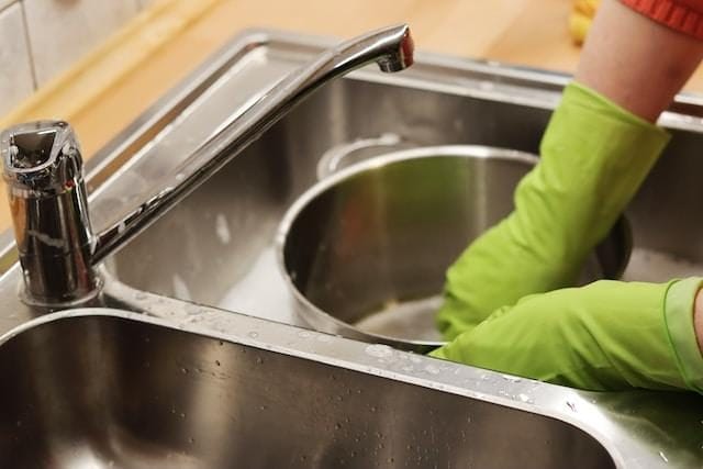 hidden grease buildup behind kitchen appliances